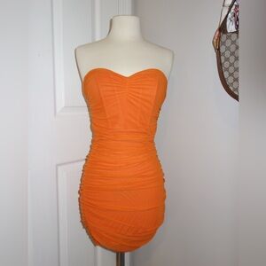 Stretchy orange mini dress